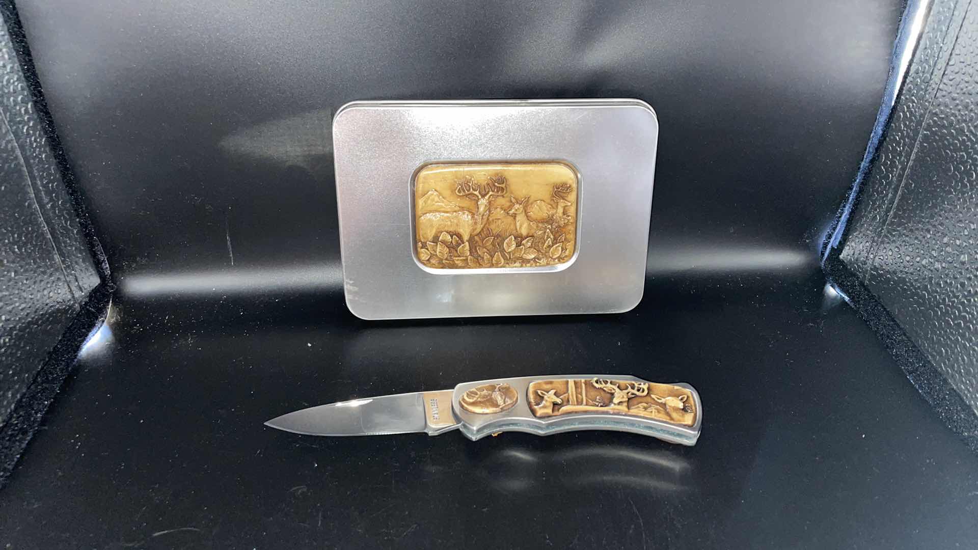 Photo 1 of DECORATIVE BUCK TIN WITH POCKET KNIFE AND KEYCHAIN