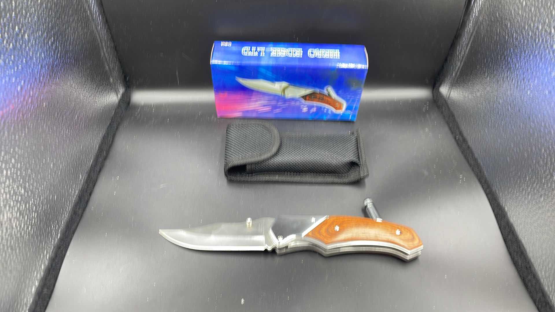 Photo 1 of HERO EDGE FOLDING KNIFE AND SHEATH 9”