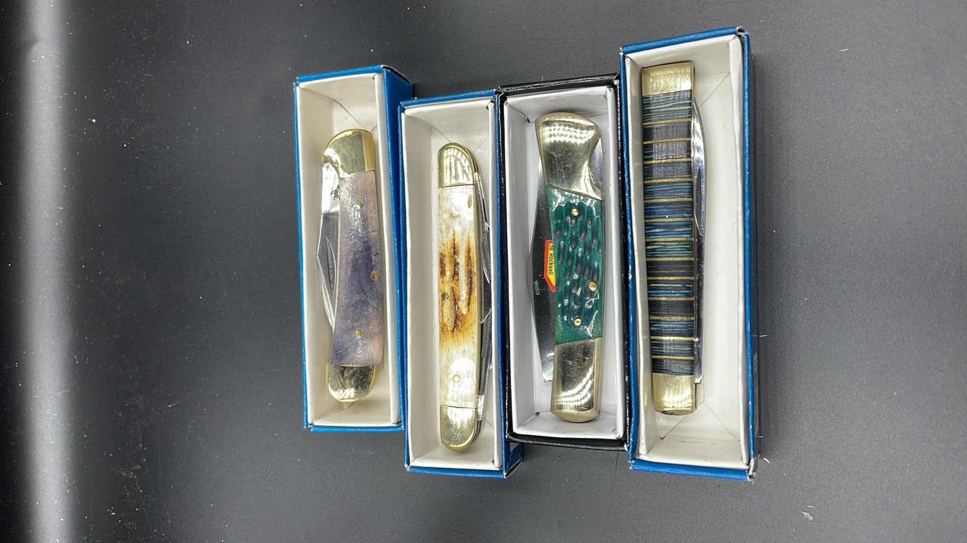 Photo 1 of FROST CUTLERY AND STEEL WARRIOR 4PC POCKET KNIFE SET