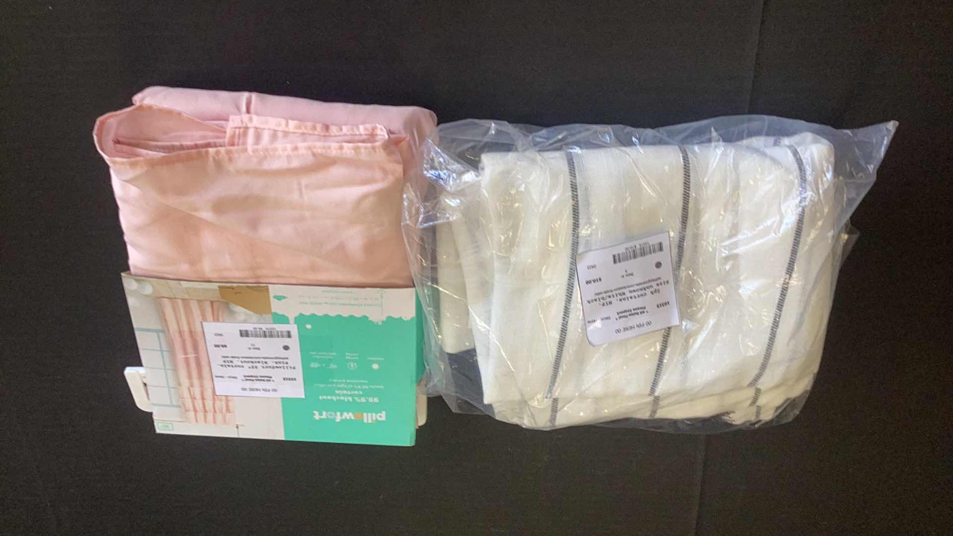 Photo 1 of TWO SETS OF CURTAINS ONE IS BLACK OUT