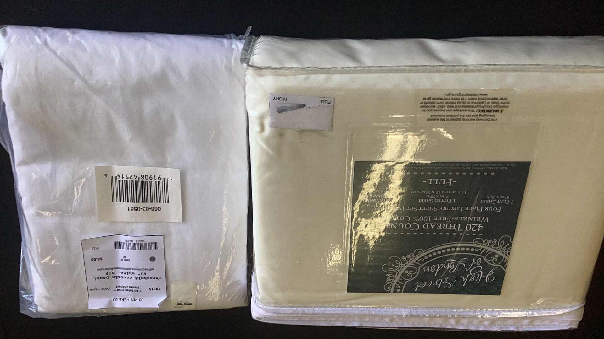 Photo 1 of CURTAINS AND A FULL SHEET SET