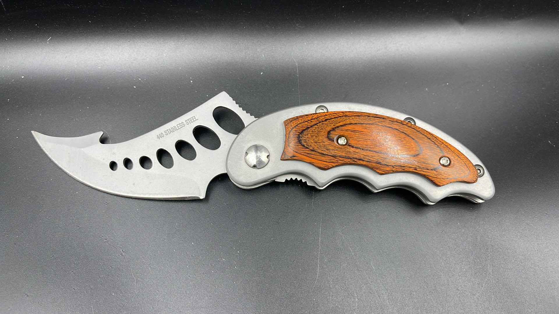 Photo 1 of FOLDING HUNTING/ HIKING KNIFE 7.5”