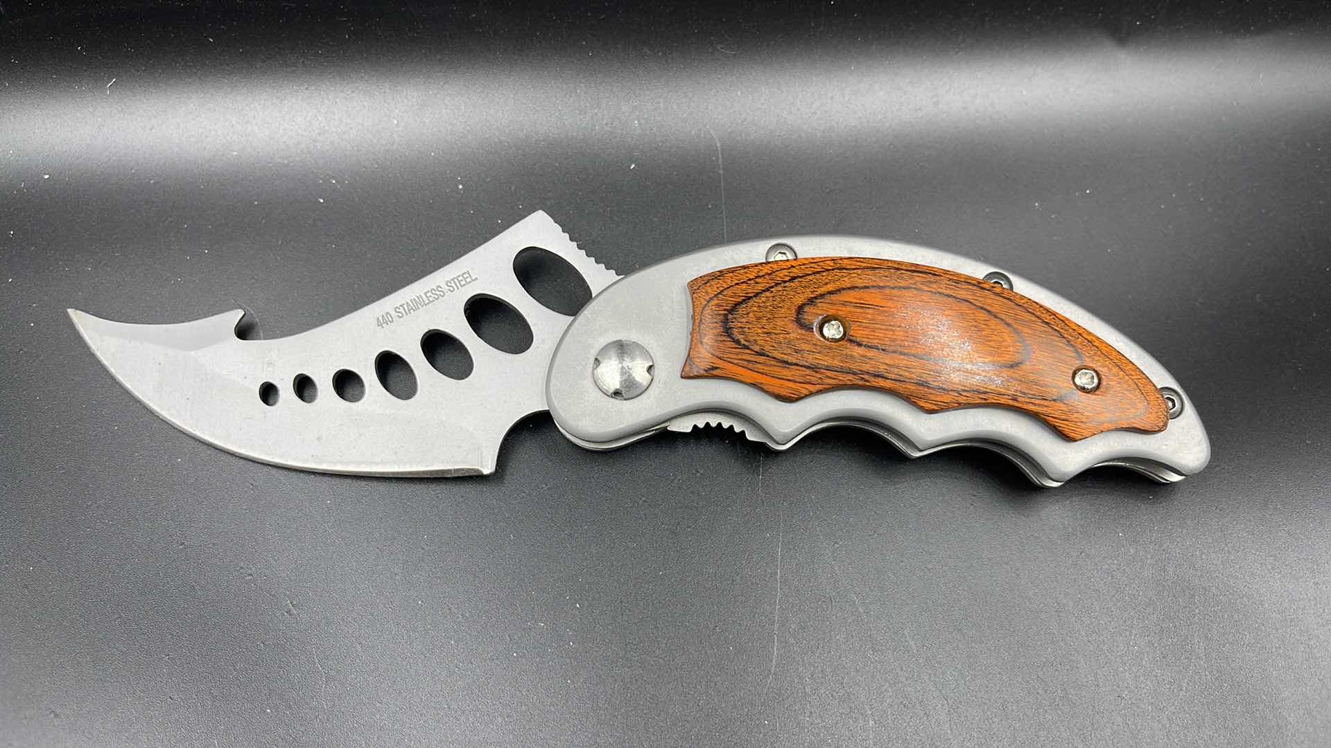 Photo 1 of FOLDING HUNTING/ HIKING KNIFE 7.5”