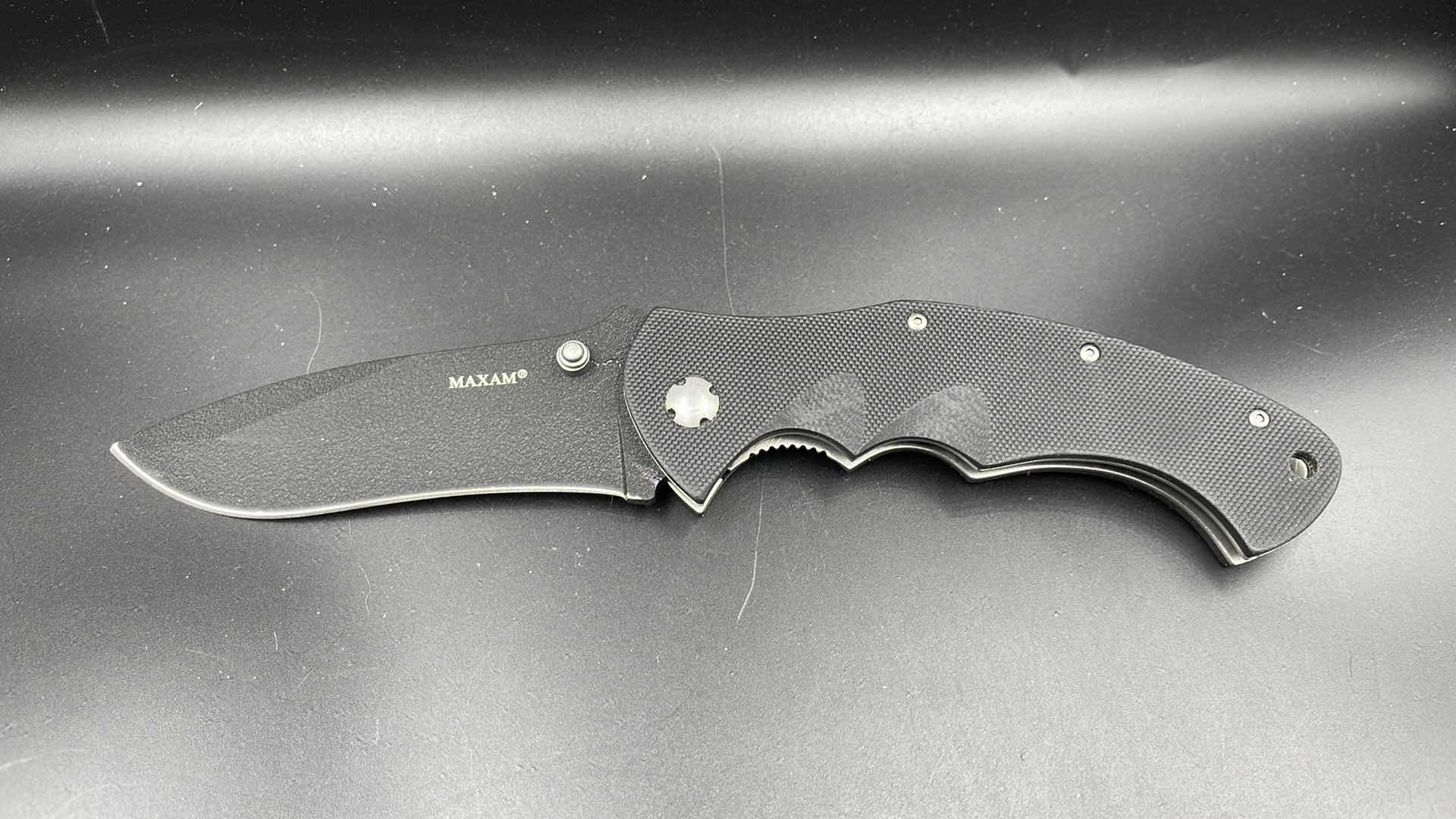 Photo 1 of MAXAM FOLDING BLACK HUNTING KNIFE 9”