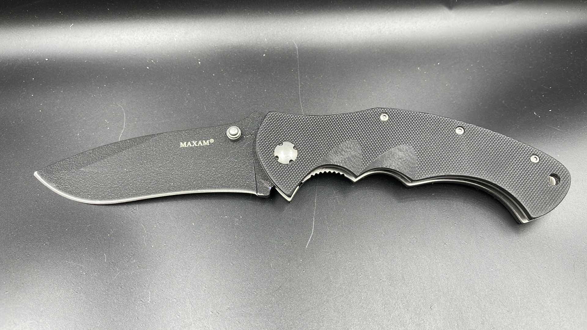 Photo 1 of MAXAM FOLDING BLACK HUNTING KNIFE 9”