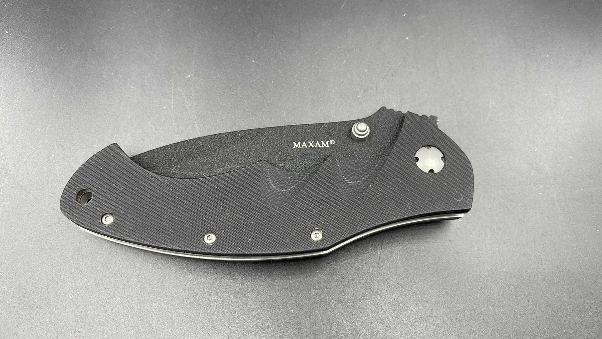 Photo 1 of MAXAM FOLDING BLACK HUNTING KNIFE 9”