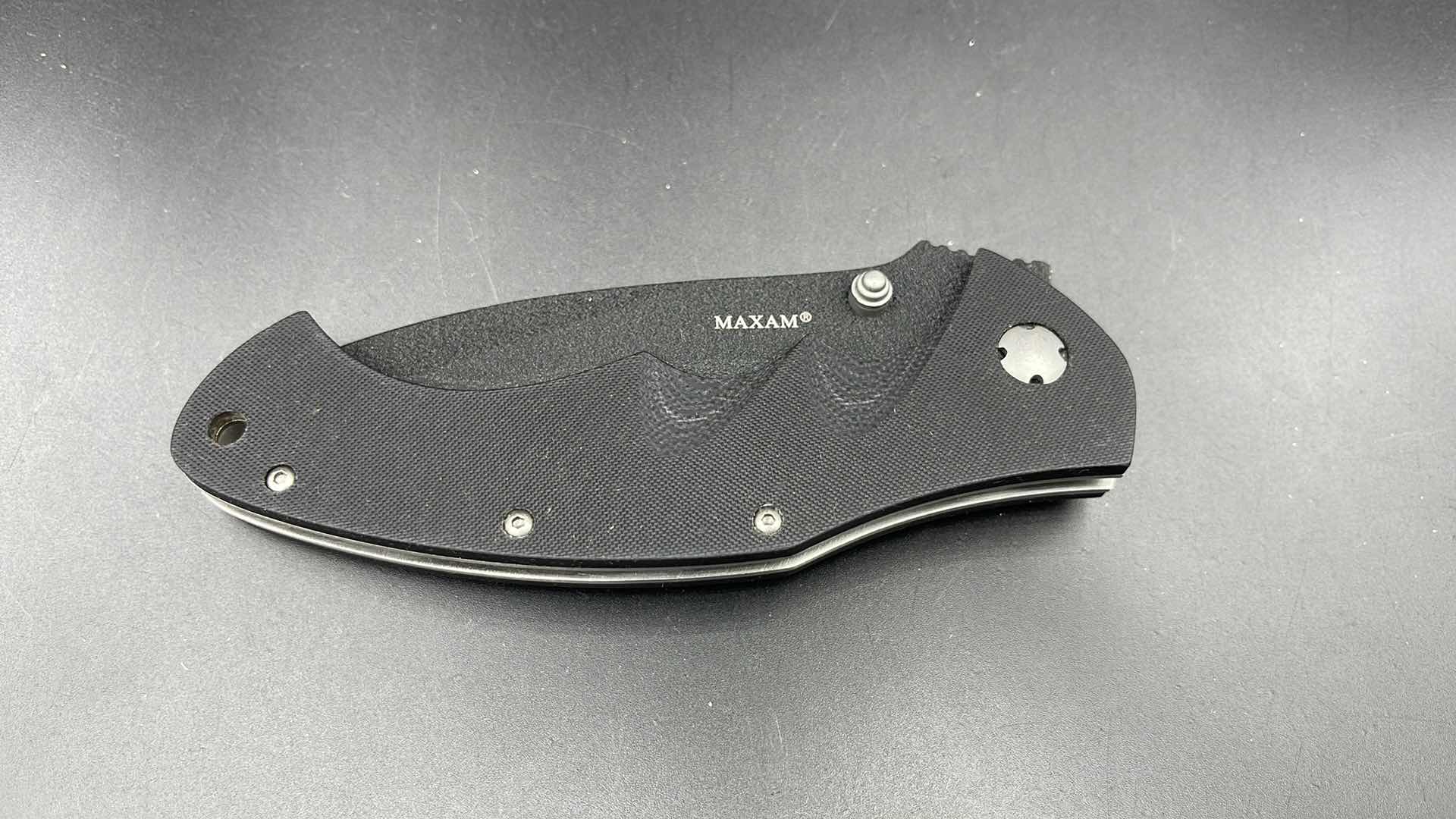 Photo 1 of MAXAM FOLDING BLACK HUNTING KNIFE 9”