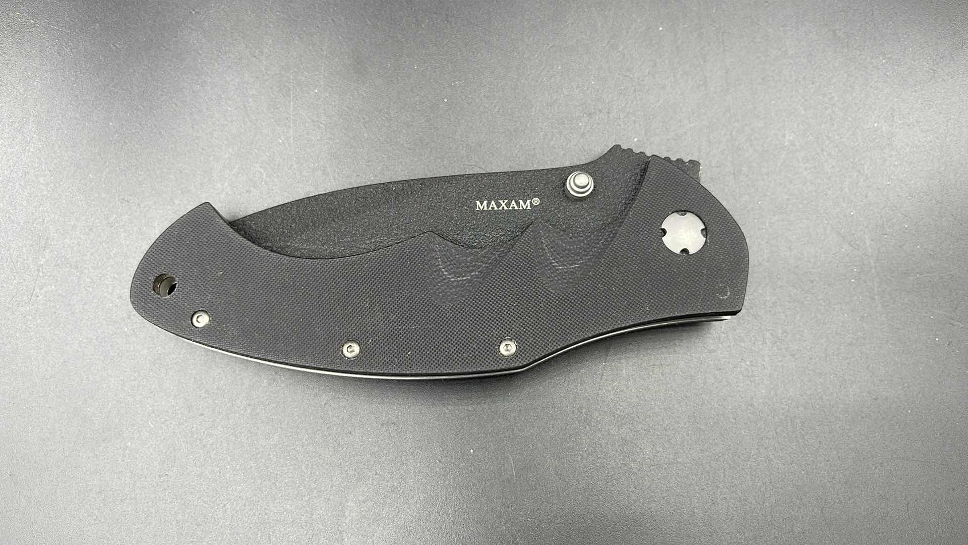 Photo 1 of MAXAM FOLDING BLACK HUNTING KNIFE 9”