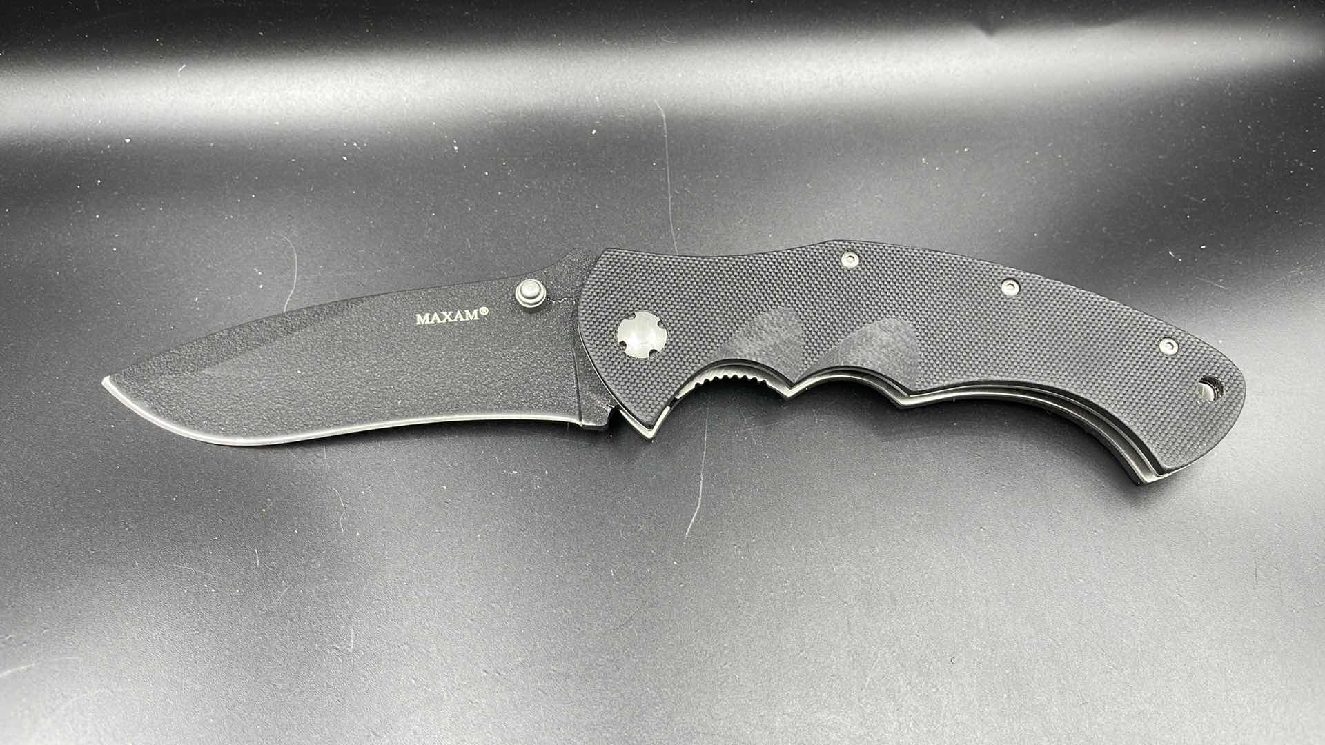 Photo 1 of MAXAM FOLDING BLACK HUNTING KNIFE 9”