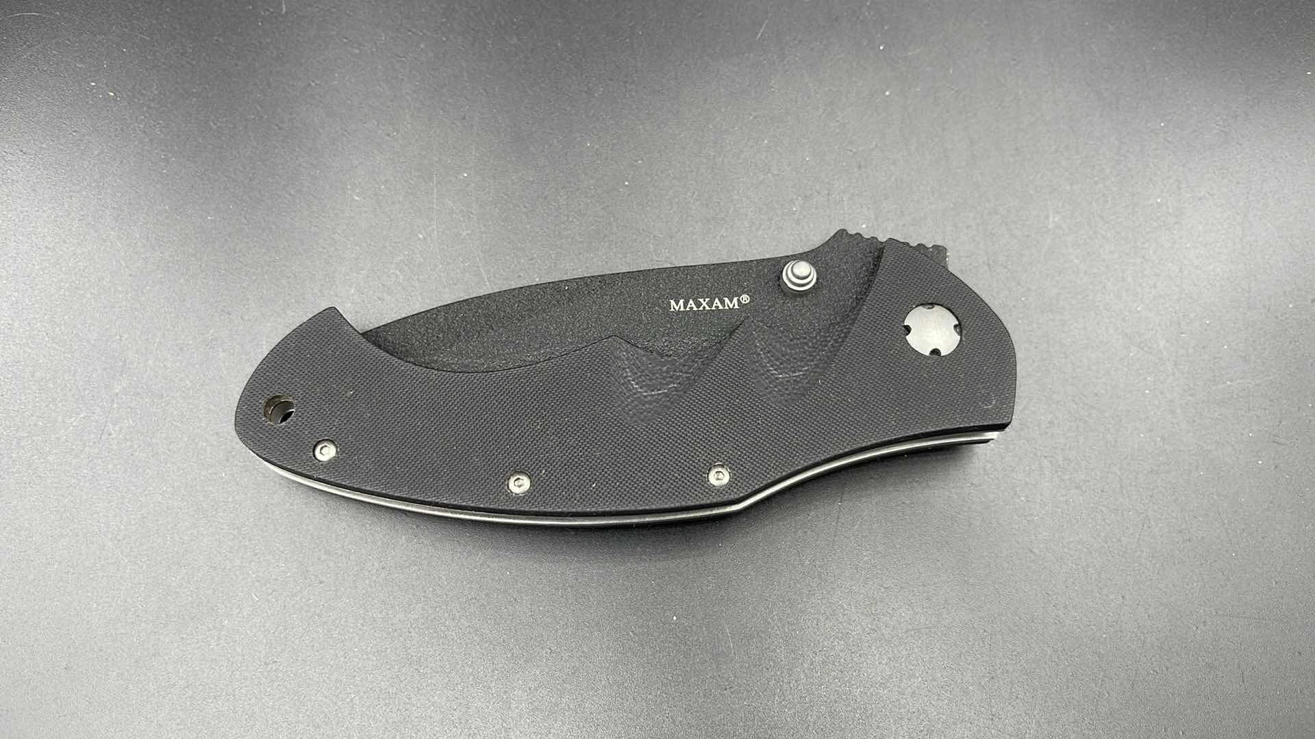 Photo 1 of MAXAM FOLDING BLACK HUNTING KNIFE 9”