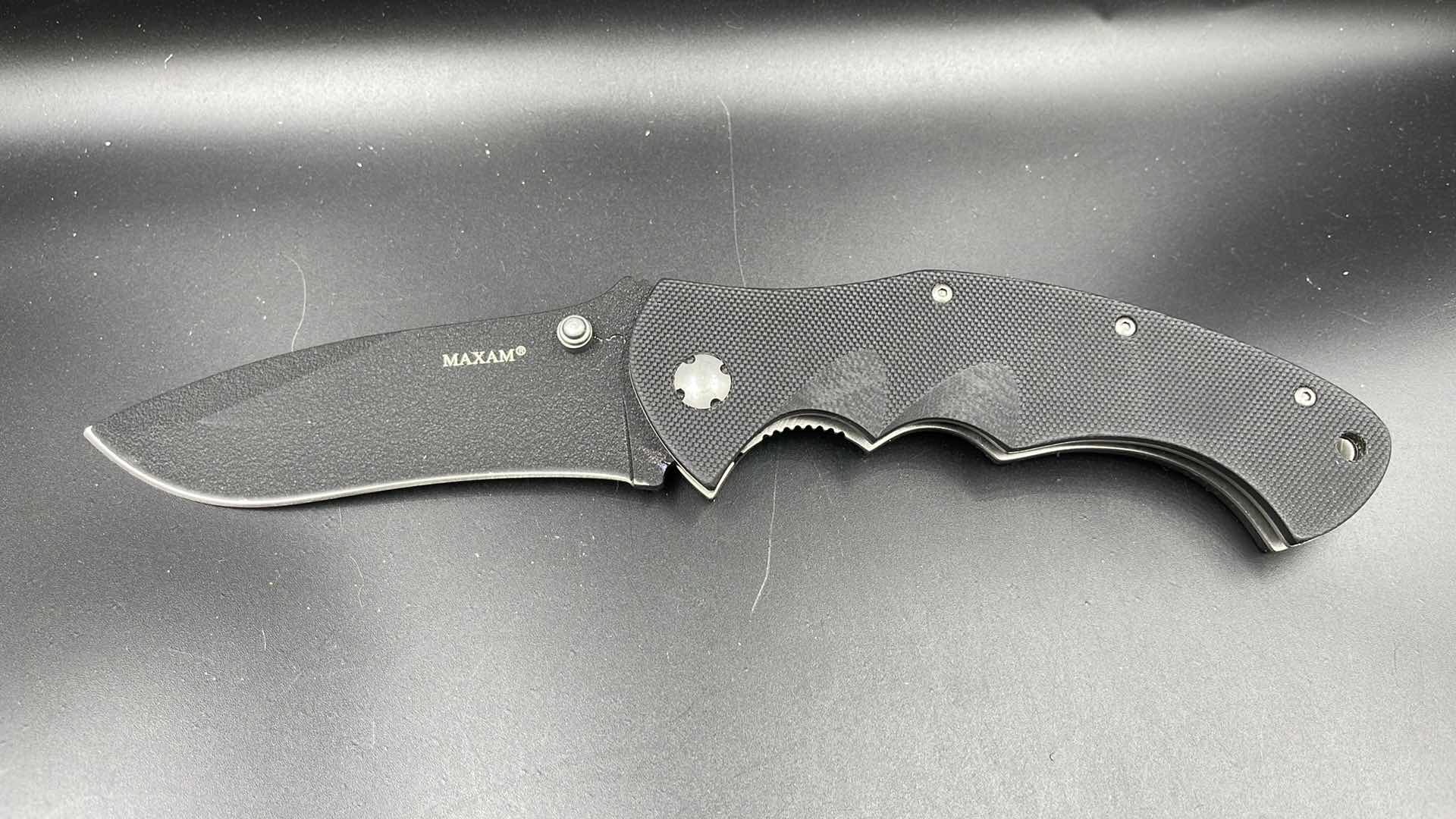 Photo 1 of MAXAM FOLDING BLACK HUNTING KNIFE 9”