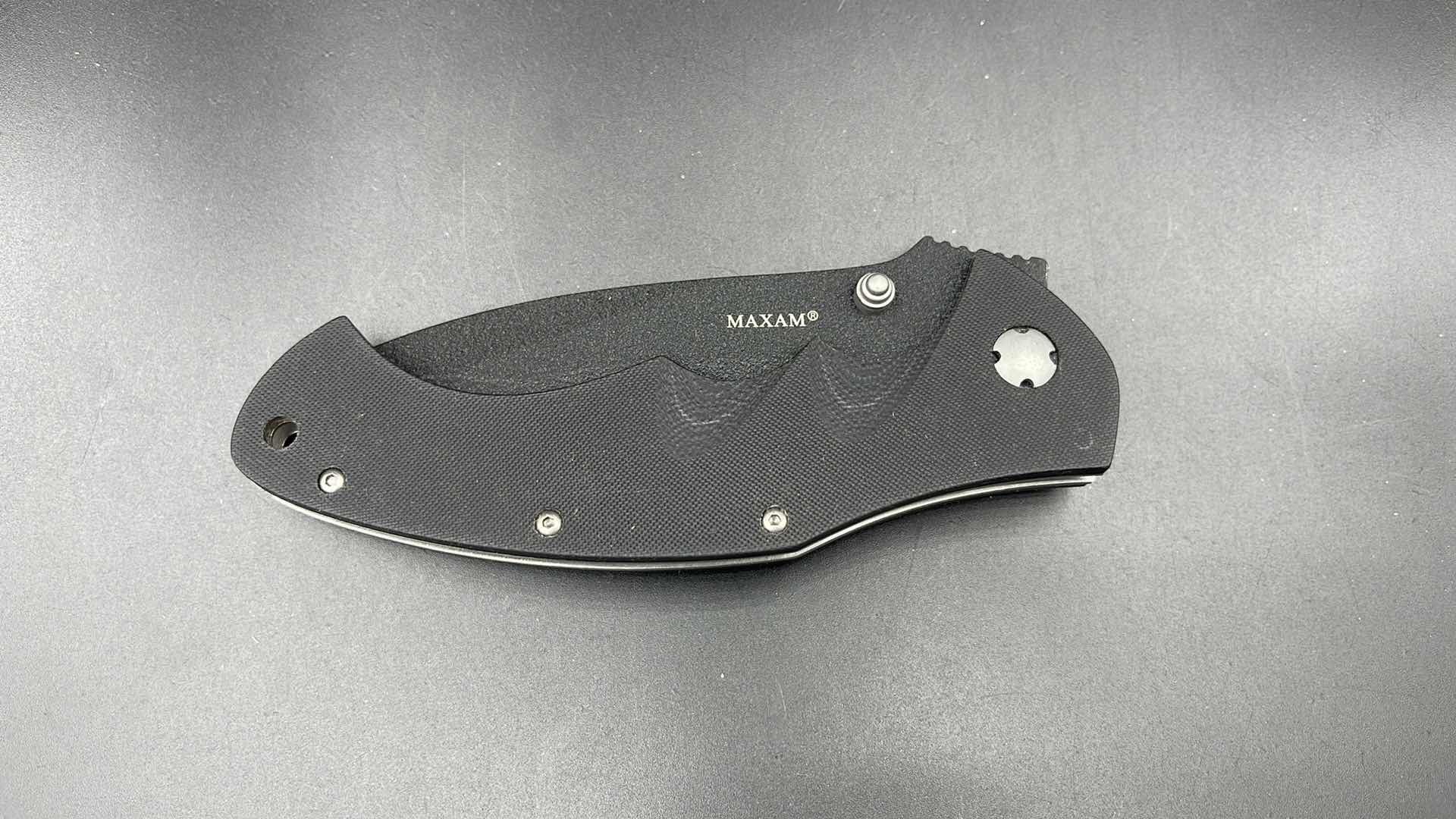 Photo 1 of MAXAM FOLDING BLACK HUNTING KNIFE 9”