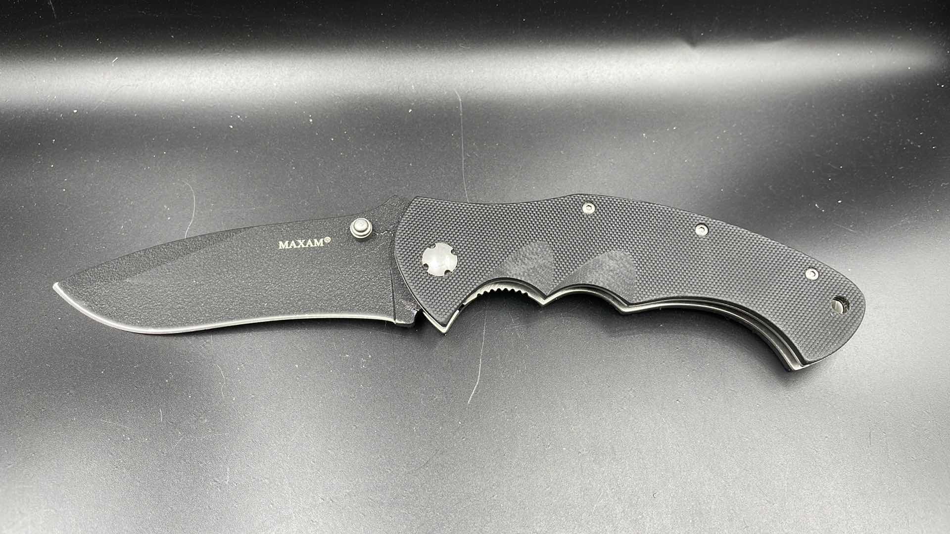 Photo 1 of MAXAM FOLDING BLACK HUNTING KNIFE 9”