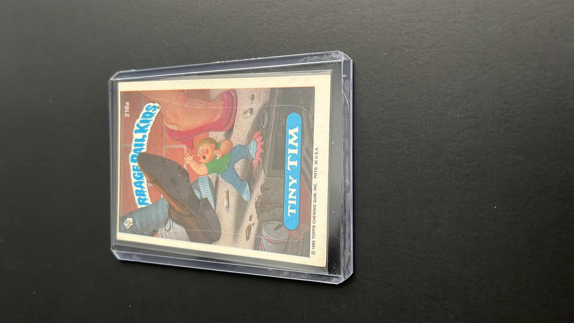 Photo 1 of 1986 GARBAGE PAIL KIDS TINY TIM TOPPS 216A