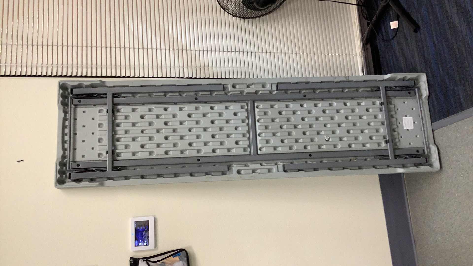 Photo 1 of MULTIPURPOSE FOLDING TABLE 71”X 20” H29” 