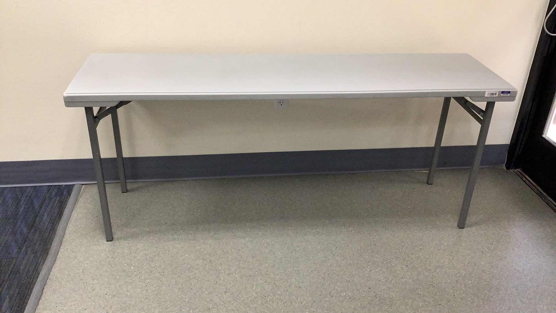 Photo 1 of MULTIPURPOSE FOLDING TABLE 71”X 20” H29”