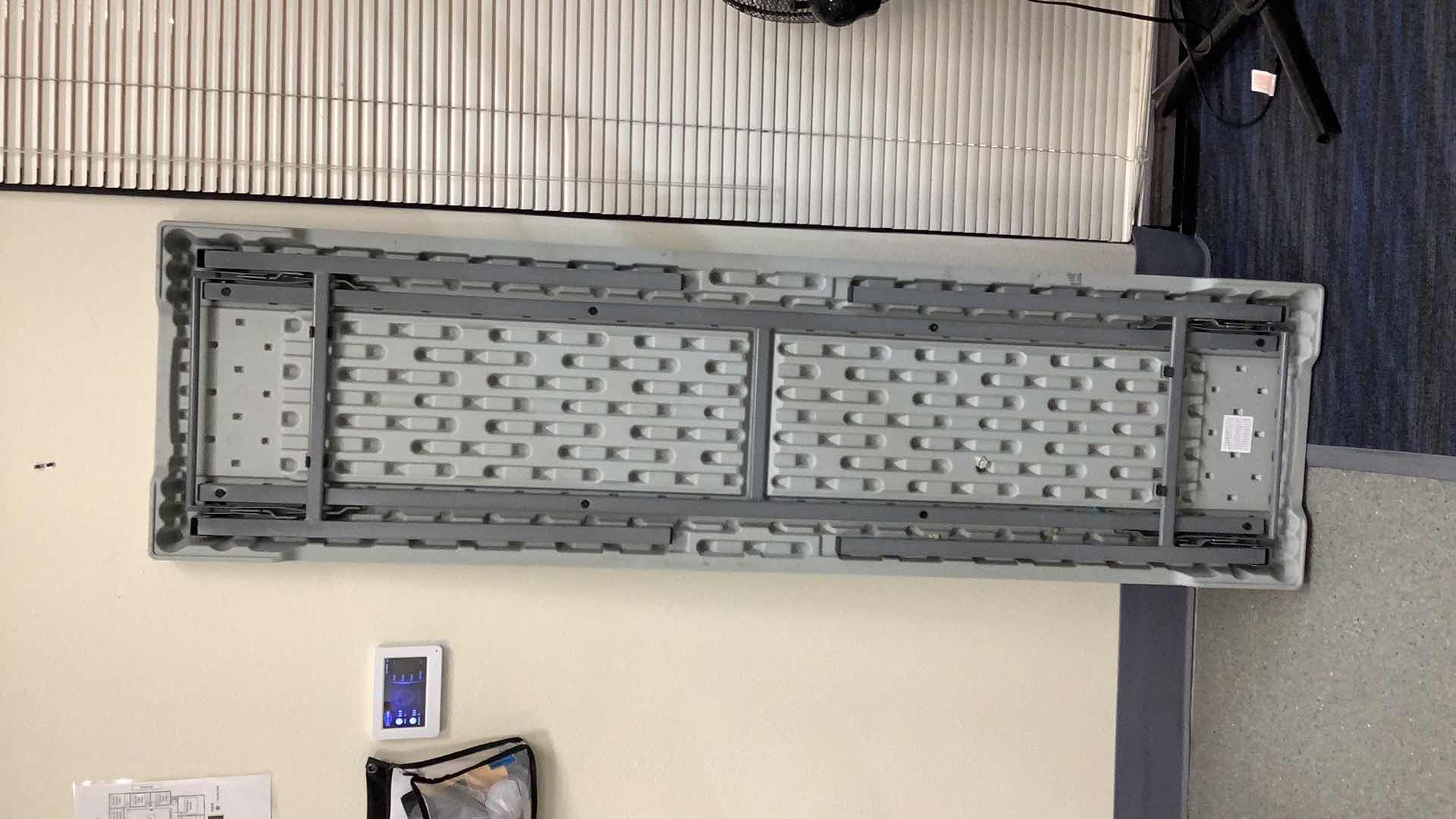 Photo 1 of MULTIPURPOSE FOLDING TABLE 71”X 20” H 29”