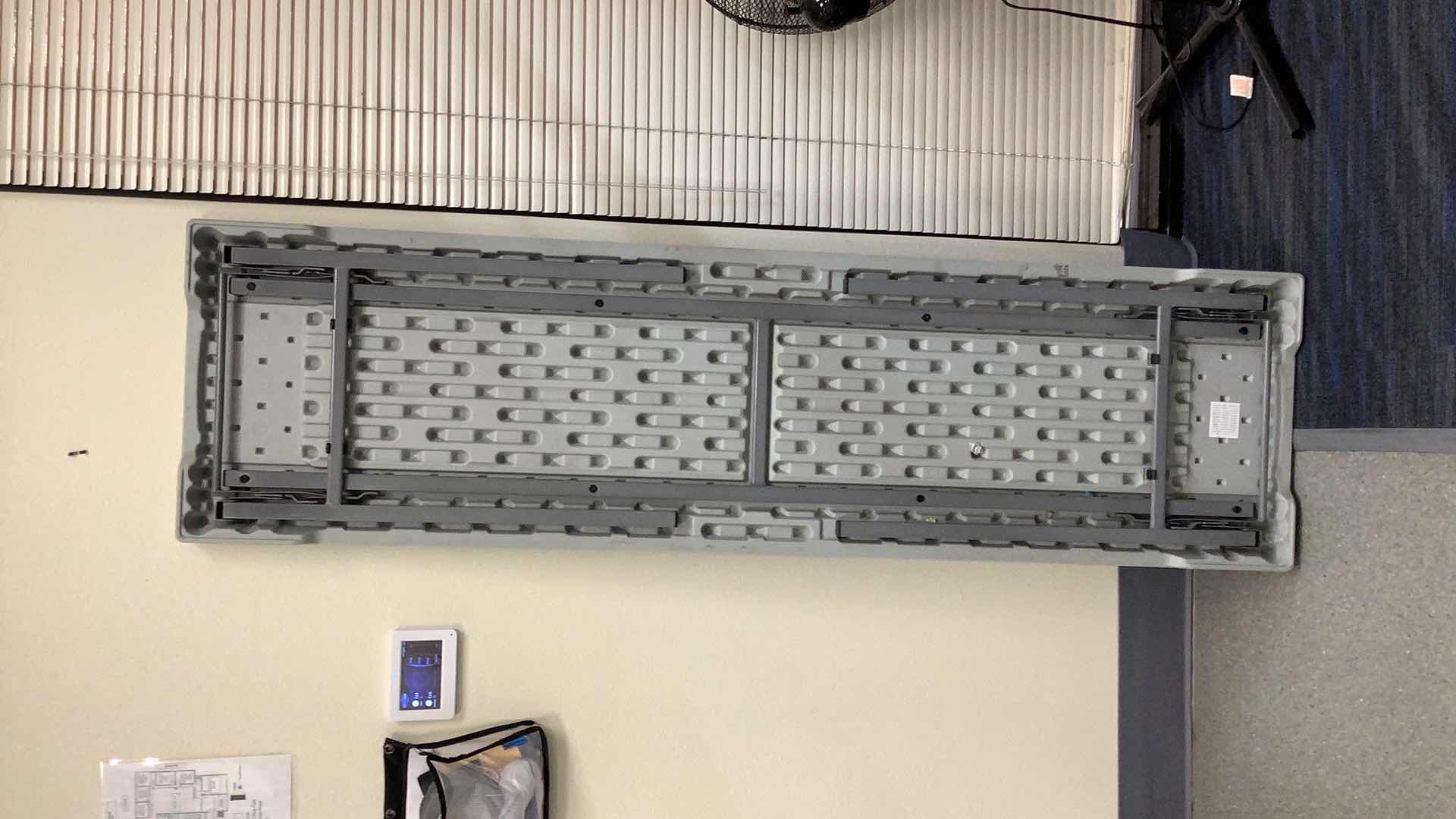 Photo 1 of MULTIPURPOSE FOLDING TABLE 71”X 20” H29” 