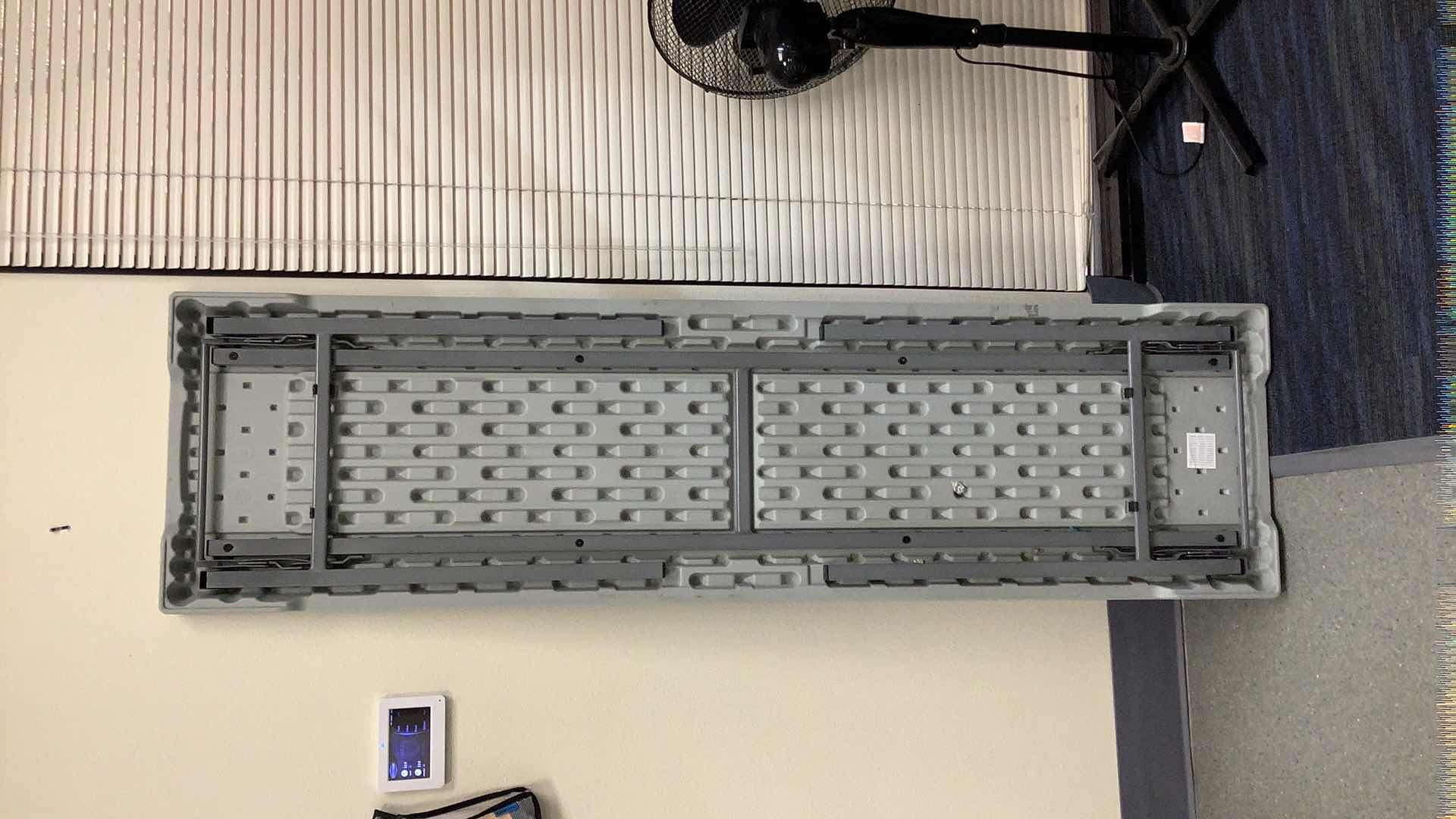 Photo 1 of MULTIPURPOSE FOLDING TABLE 71”X 20” H29” 