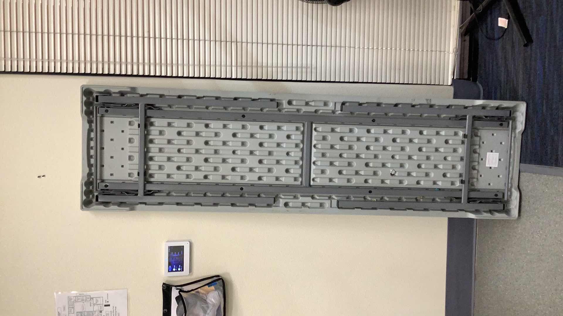 Photo 1 of MULTIPURPOSE FOLDING TABLE 71”X 20” H29” 