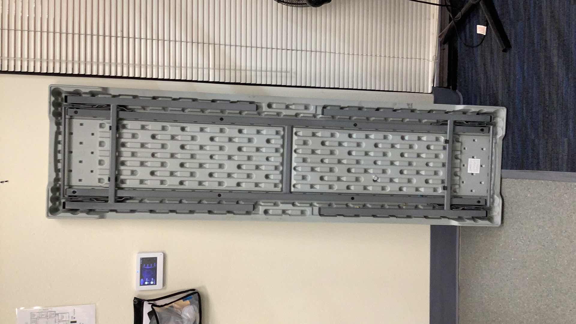 Photo 1 of MULTIPURPOSE FOLDING TABLE 71”X 20” H 29” 