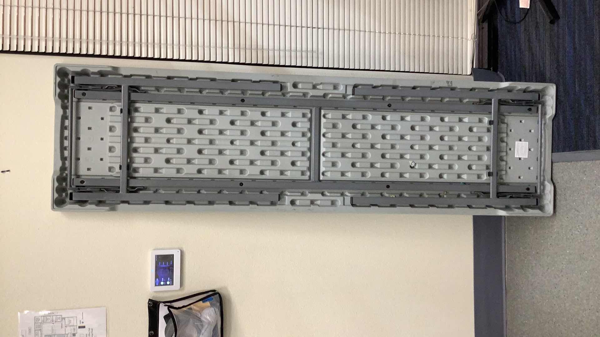 Photo 1 of MULTIPURPOSE FOLDING TABLE 71”X 20” H29” 