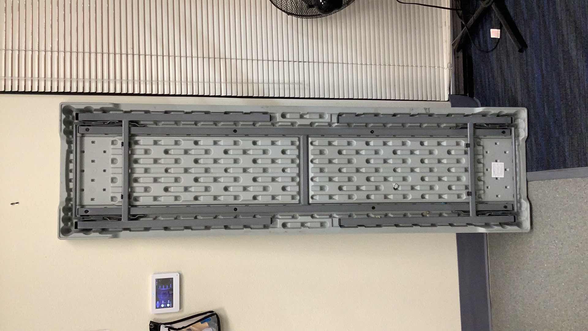 Photo 1 of MULTIPURPOSE FOLDING TABLE 71”X 20” H29” 