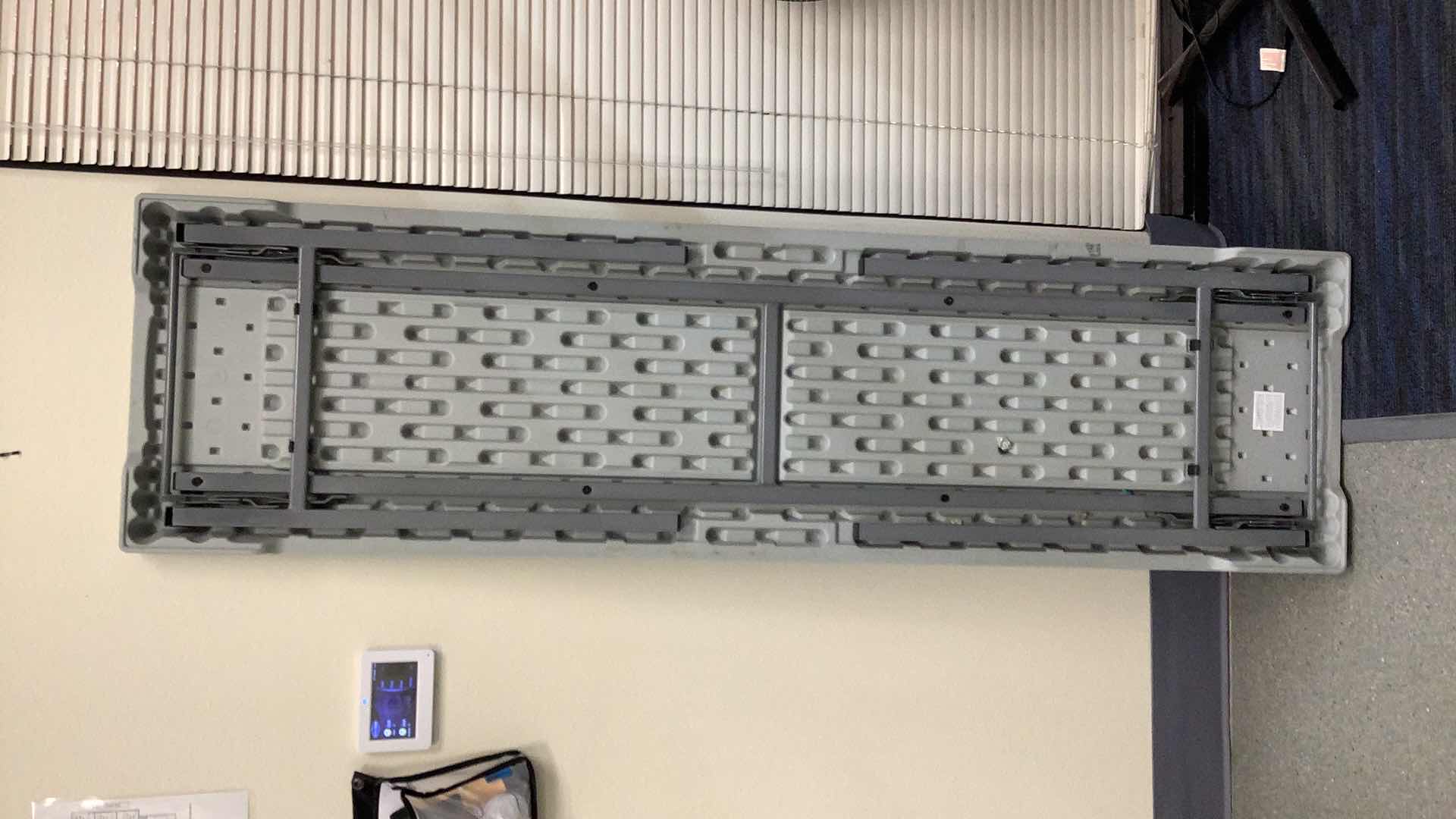 Photo 1 of MULTIPURPOSE FOLDING TABLE 71”X 20” H29” 