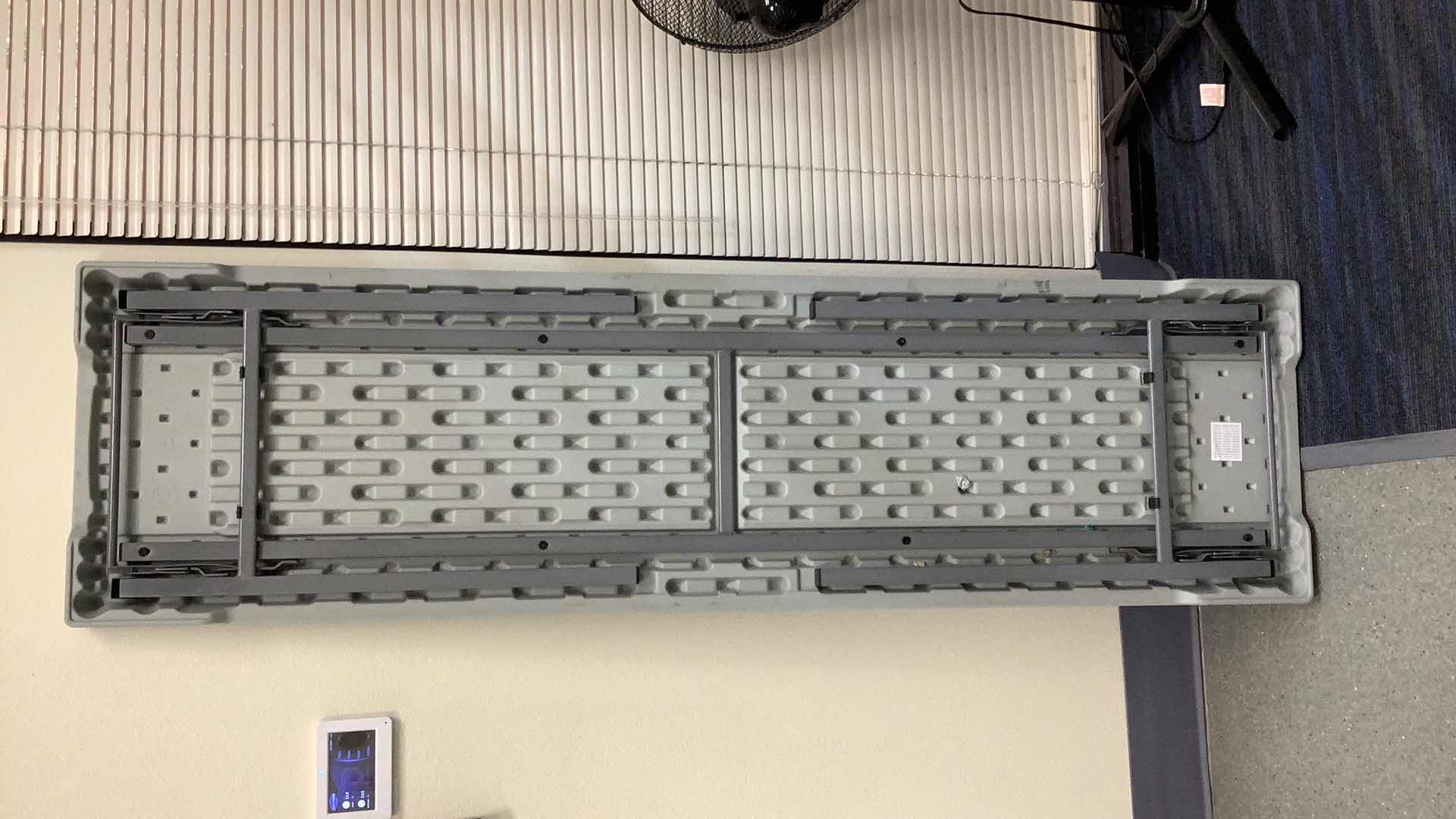 Photo 1 of MULTIPURPOSE FOLDING TABLE 71”X 20” H29” 