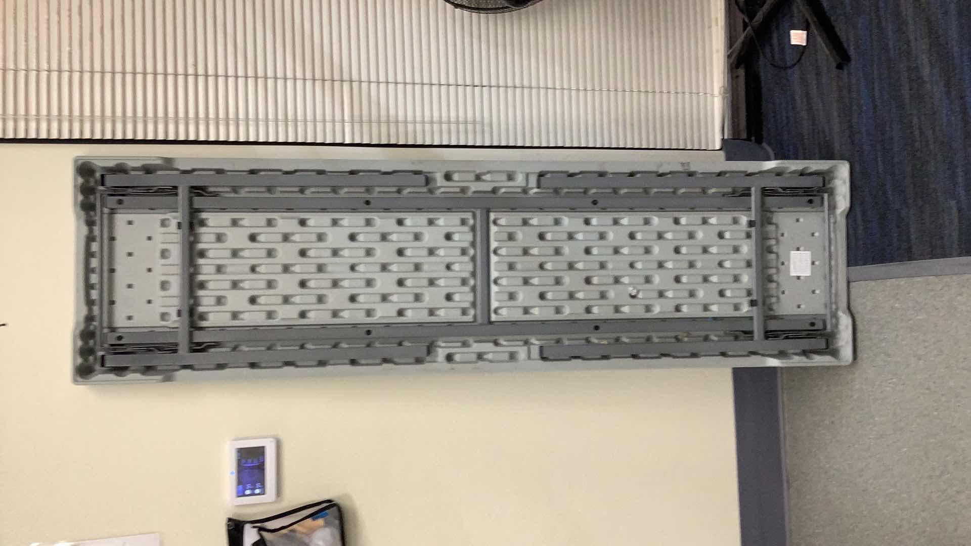 Photo 1 of MULTIPURPOSE FOLDING TABLE 71”X 20” H29” 