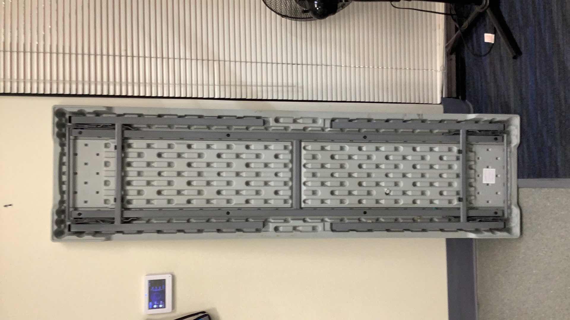 Photo 1 of MULTIPURPOSE FOLDING TABLE 71”X 20” H29” 