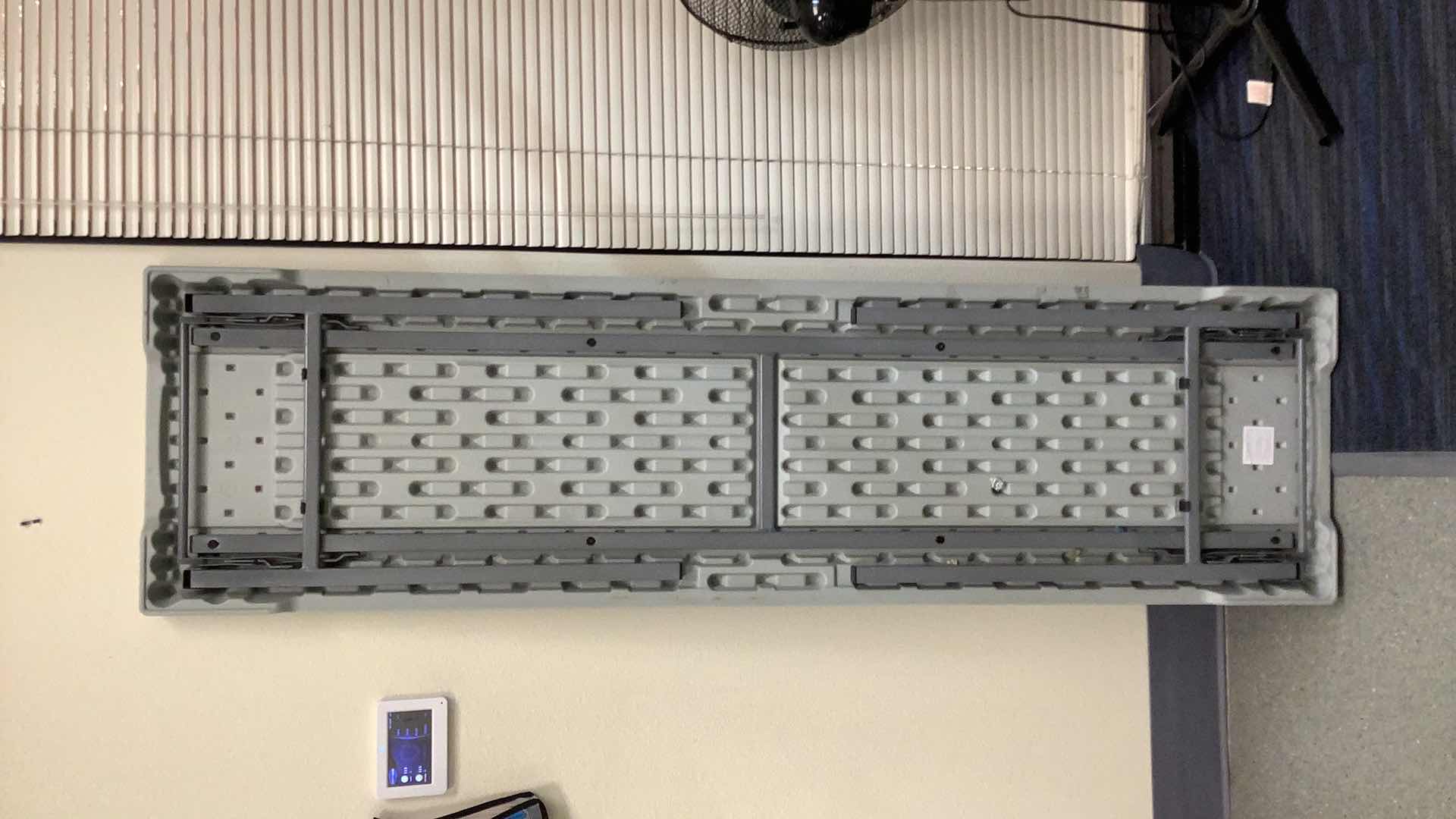 Photo 1 of MULTIPURPOSE FOLDING TABLE 71”X 20” H29” 