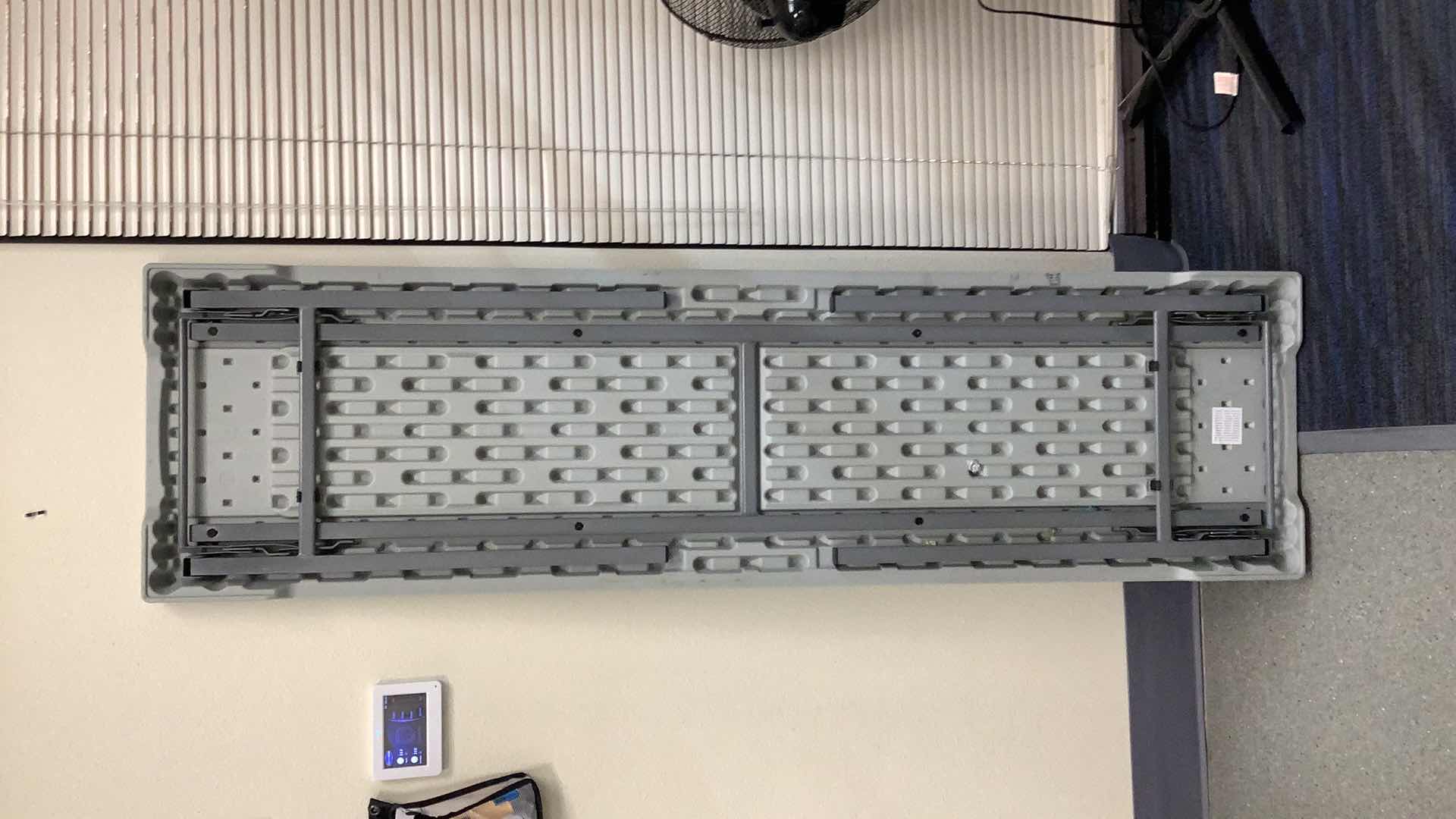 Photo 1 of MULTIPURPOSE FOLDING TABLE 71”X 20” H29” 