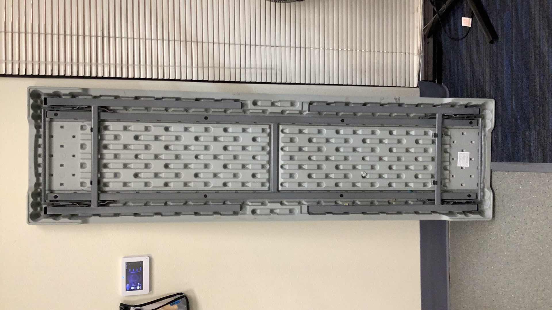 Photo 1 of MULTIPURPOSE FOLDING TABLE 71”X 20” H29” 