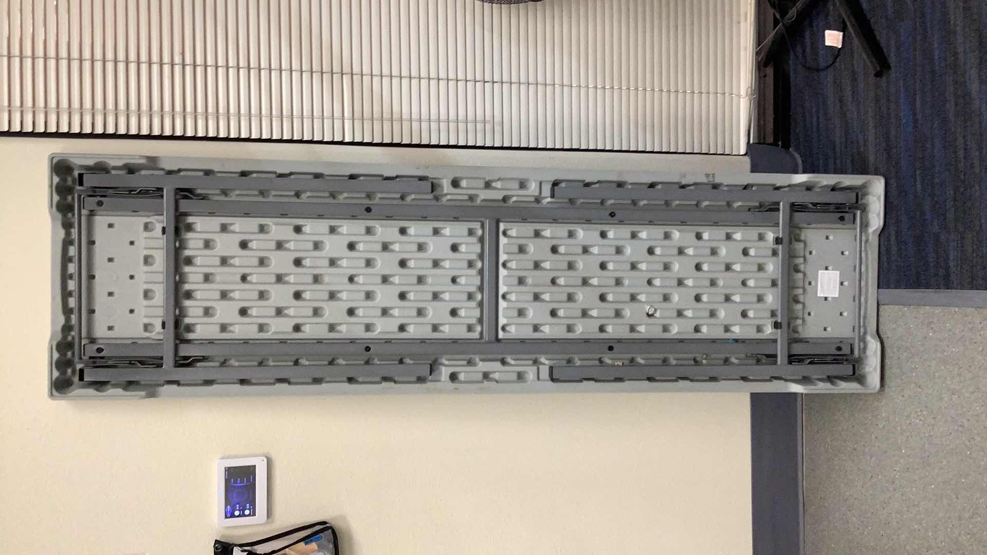 Photo 1 of MULTIPURPOSE FOLDING TABLE 71”X 20” H29” 