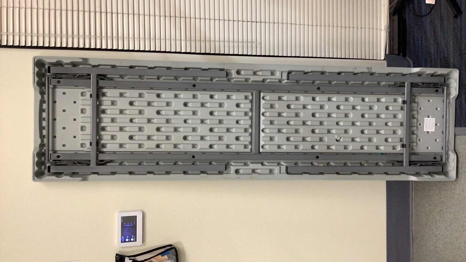 Photo 1 of MULTIPURPOSE FOLDING TABLE 71”X 20” H29” 