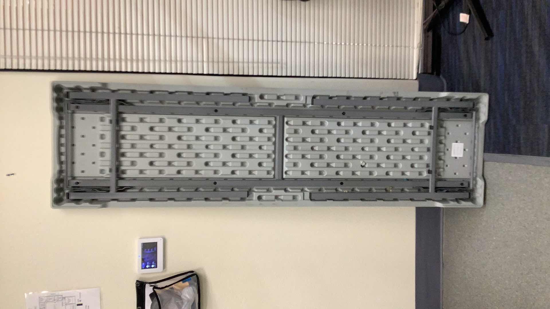 Photo 1 of MULTIPURPOSE FOLDING TABLE 71”X 20” H29” 