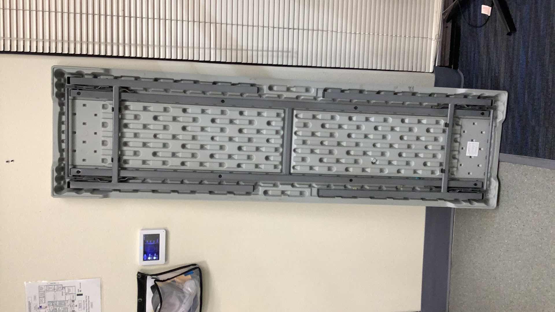 Photo 1 of MULTIPURPOSE FOLDING TABLE 71”X 20” H29” 