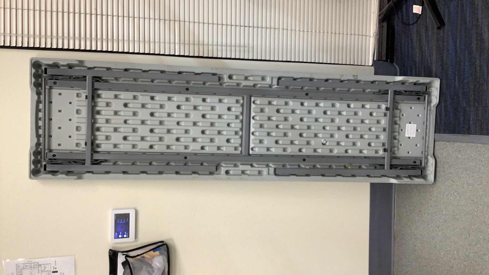 Photo 1 of MULTIPURPOSE FOLDING TABLE 71”X 20” H29” 