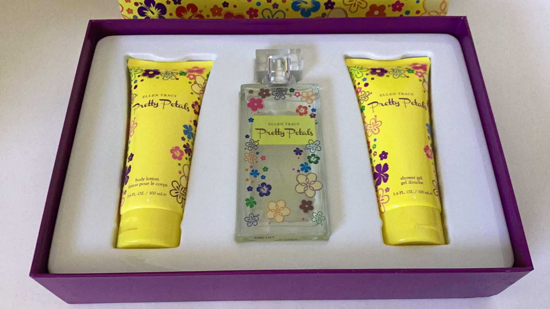Photo 1 of ELLEN TRACY PRETTY PETALS PARFUM W LOTION SET