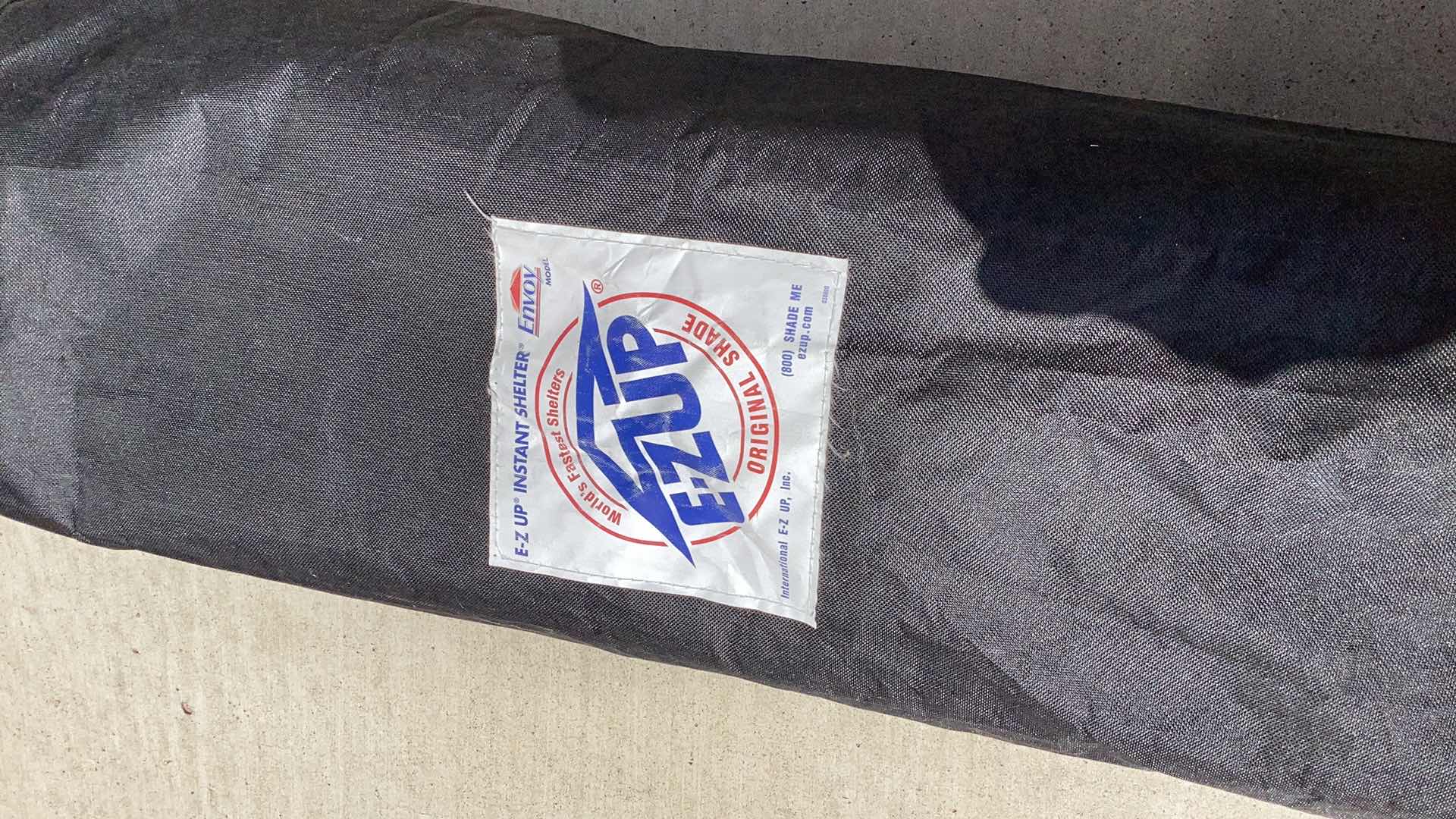 Photo 1 of EZ  UP CANVAS 10 FOOT BY 10 FOOT CANOPY WITH LEG WEIGHTS