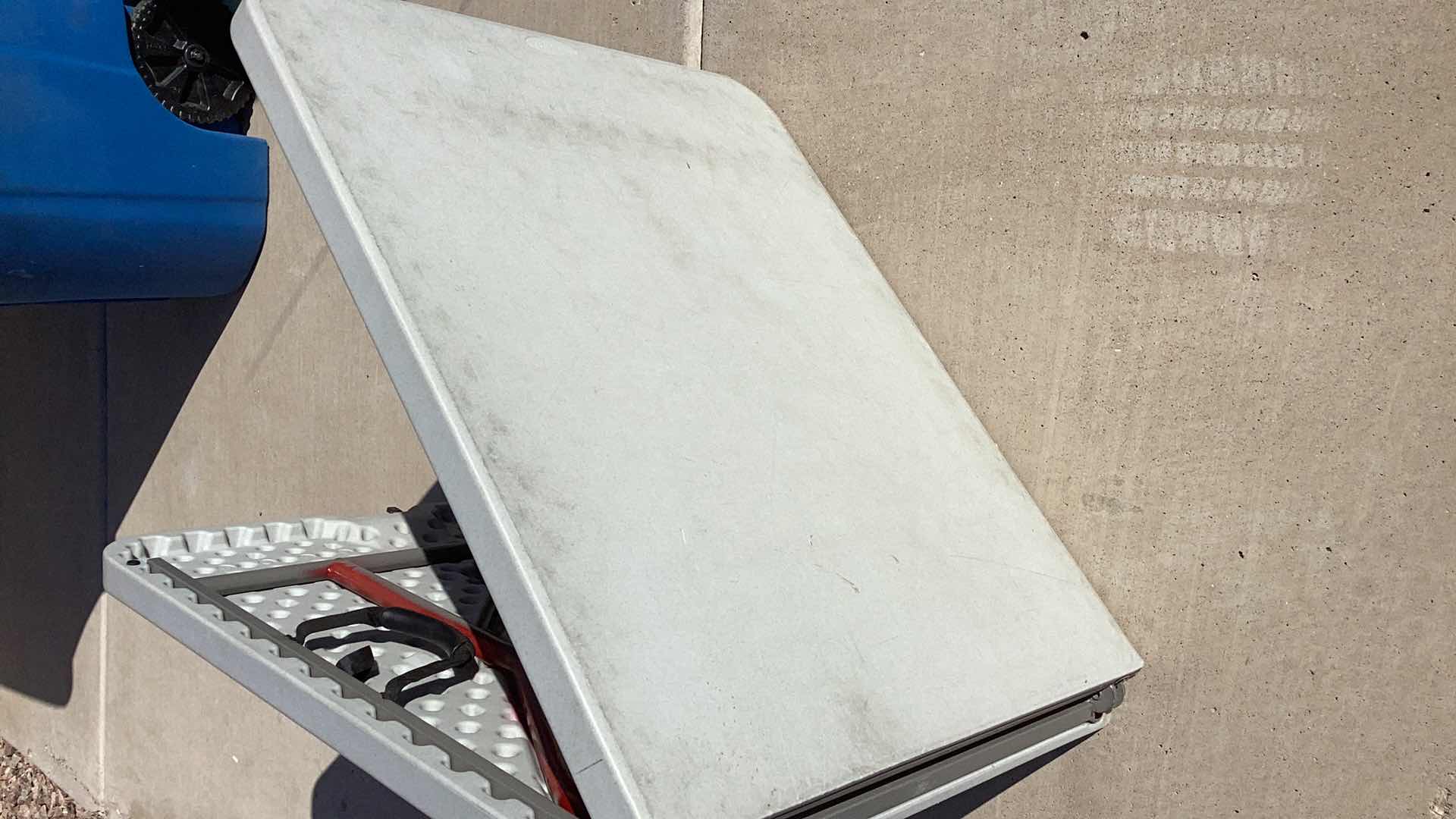 Photo 1 of 70” X 30” HEAVY DUTY 300 POUND LIMIT FOLDABLE TABLE