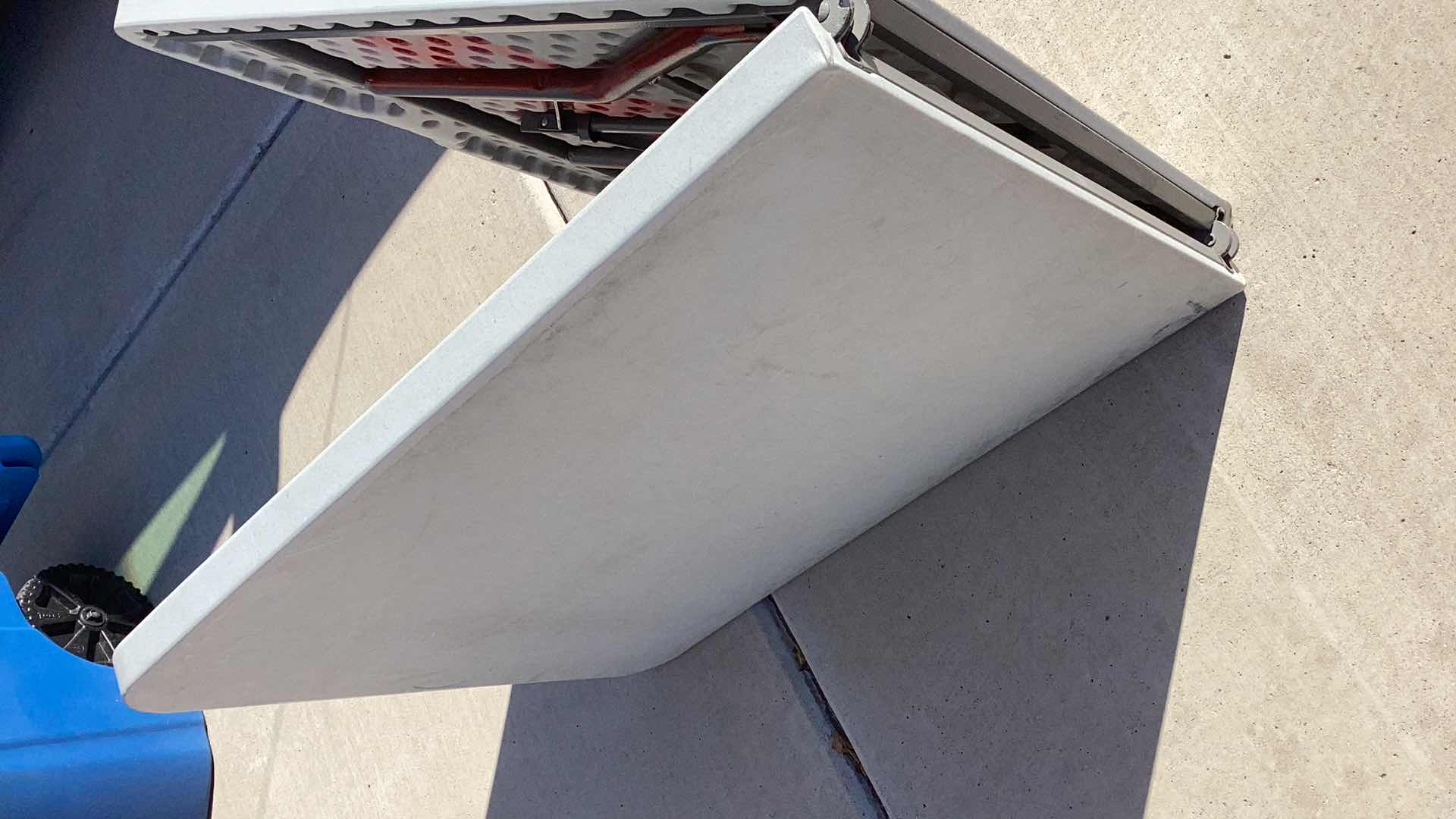 Photo 1 of 70” X 30” HEAVY DUTY 300 POUND LIMIT FOLDABLE TABLE