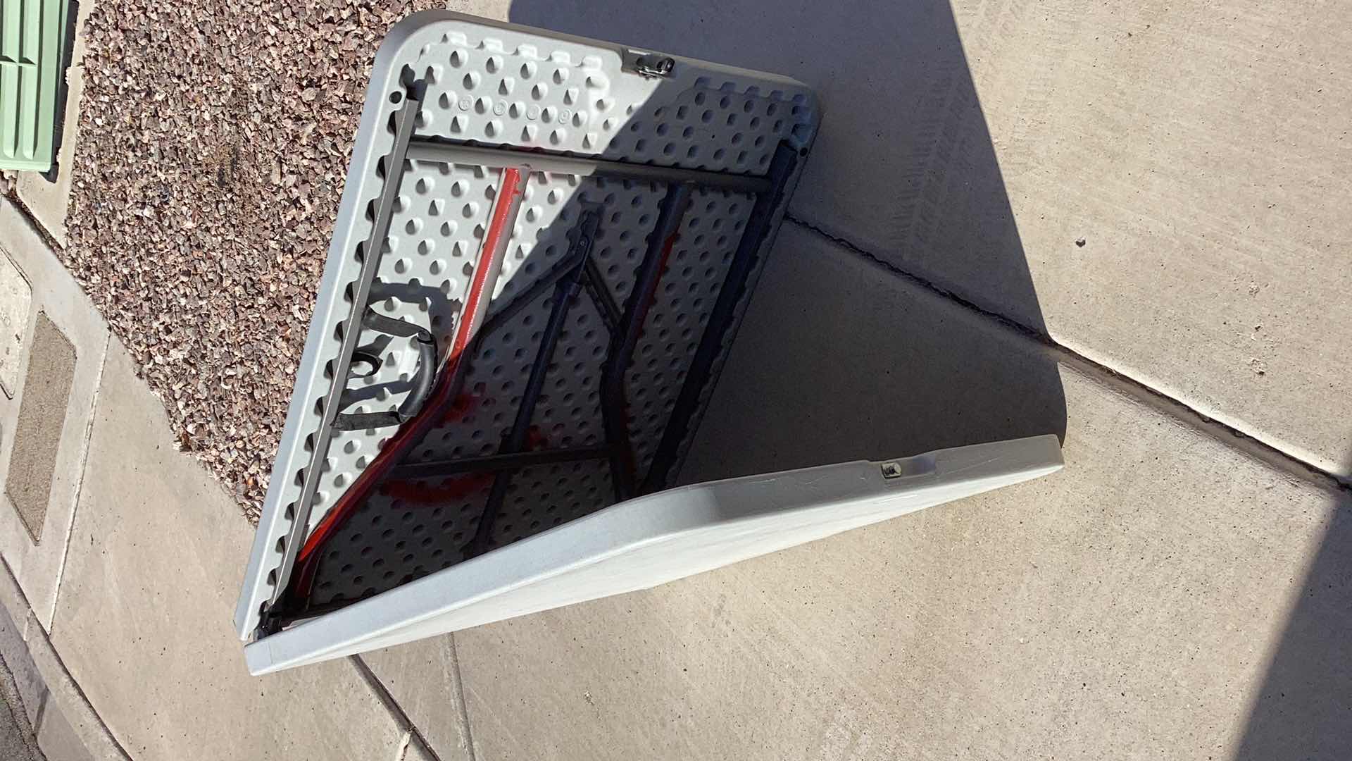 Photo 1 of 70” X 30” HEAVY DUTY 300 POUND LIMIT FOLDABLE TABLE