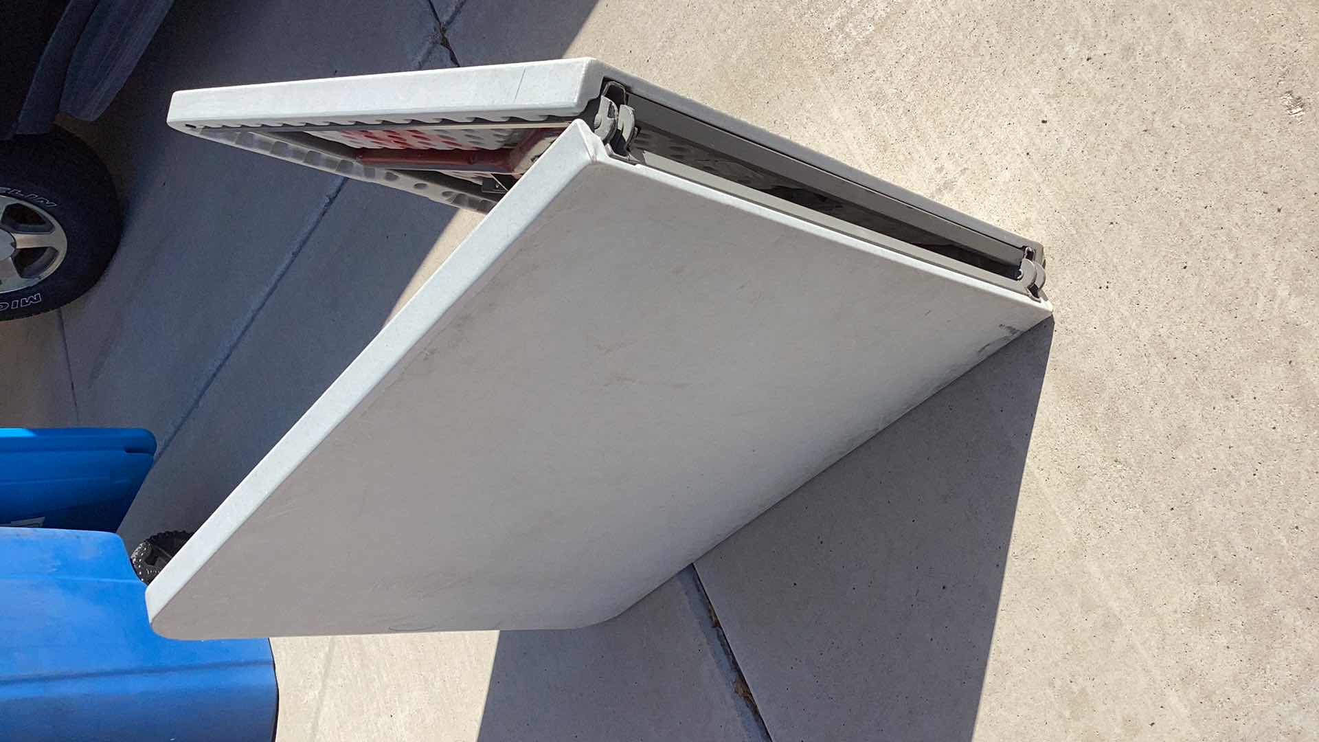 Photo 1 of 70” X 30” HEAVY DUTY 300 POUND LIMIT FOLDABLE TABLE