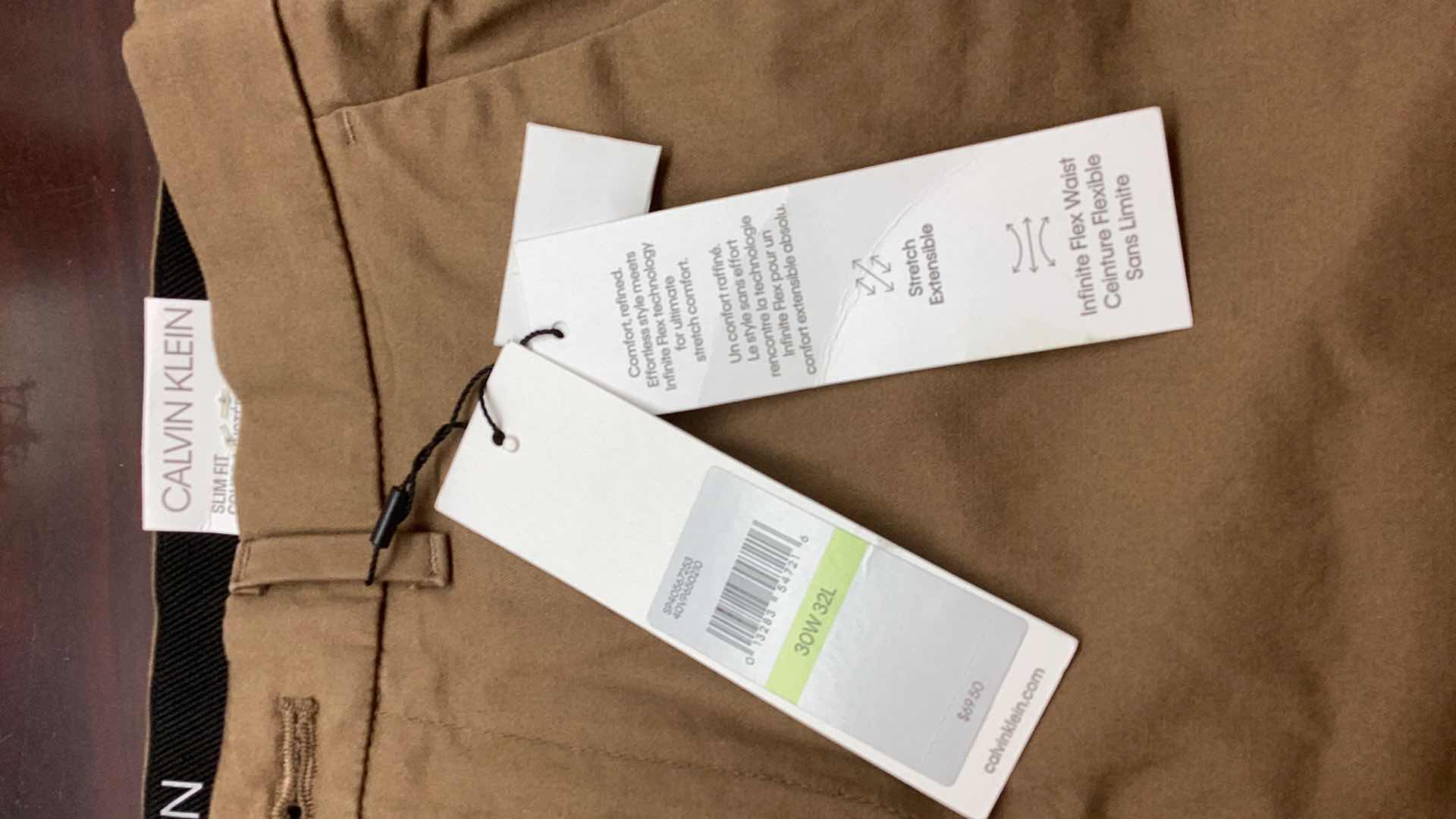 Photo 1 of CALVIN KLEIN PANT 30 X 32 NEW WITH TAGS