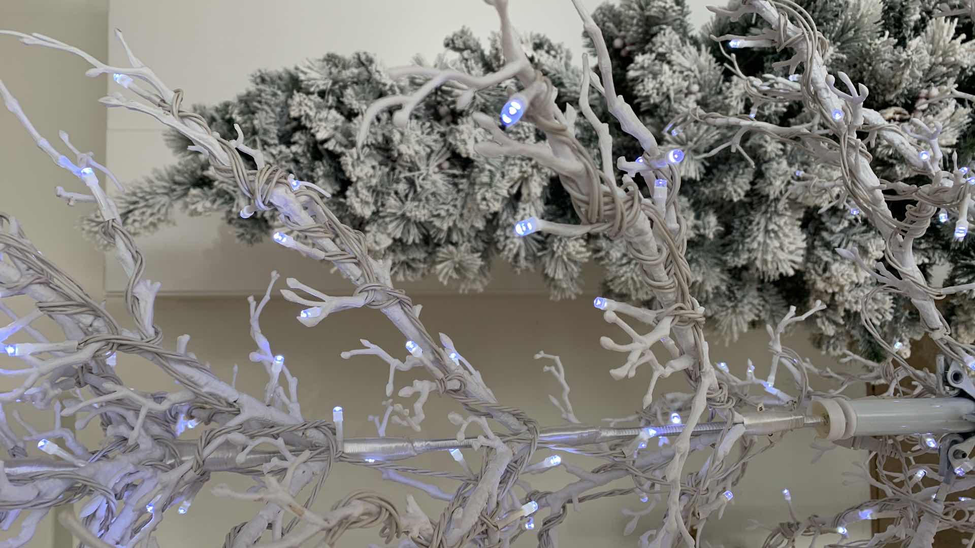 Photo 1 of TWO 7 FOOT TALL CHRISTMAS TREES ONE OUTDOOR ILLUMINATED