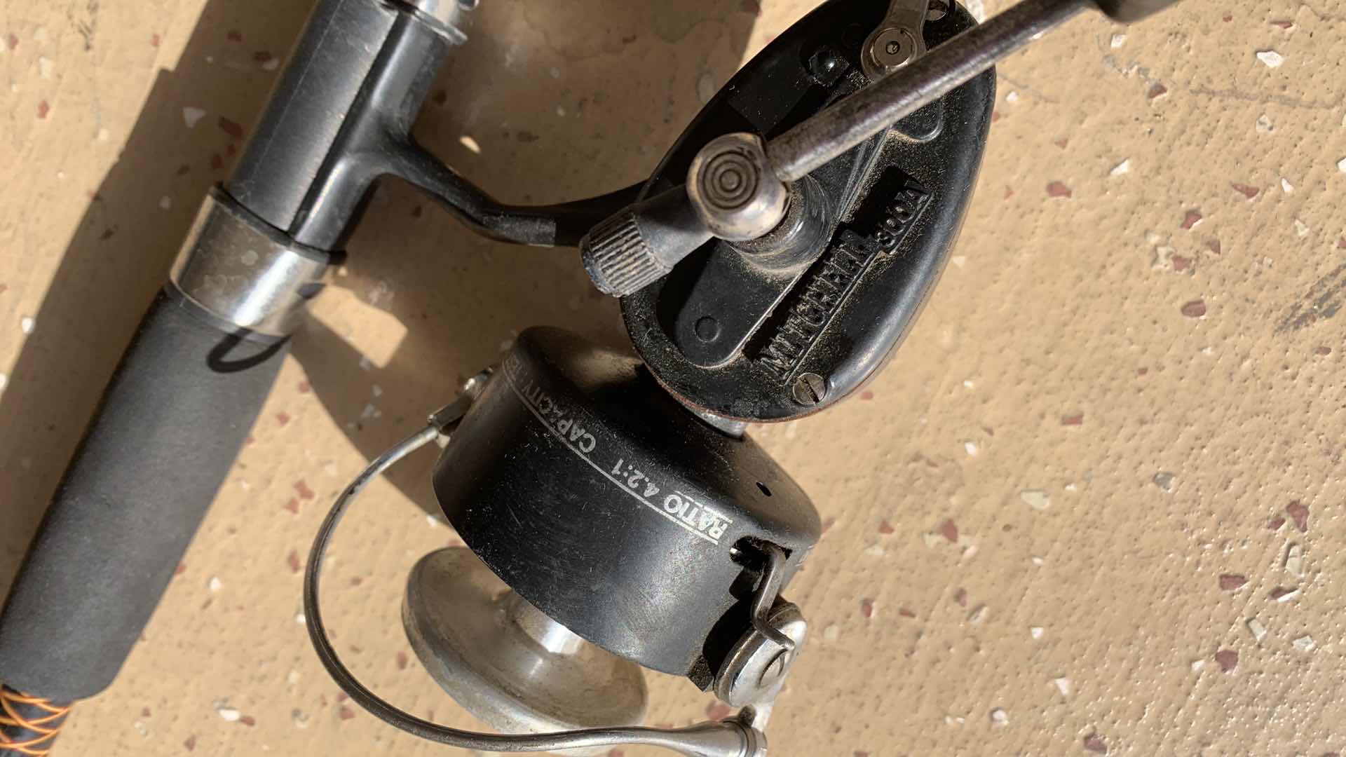 Photo 1 of SHAKESPEARE UGLY STICK AND MITCHELL 300A REEL