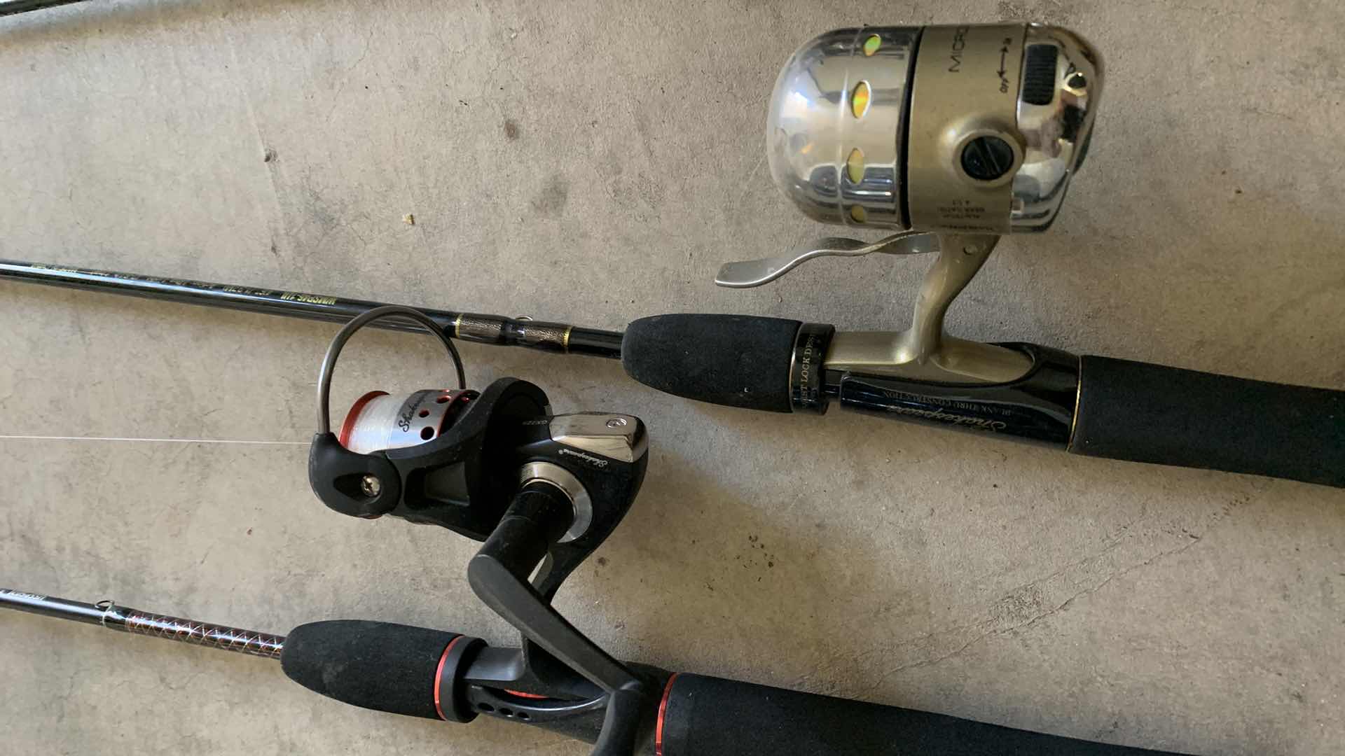 Photo 1 of FOUR FISHING REELS