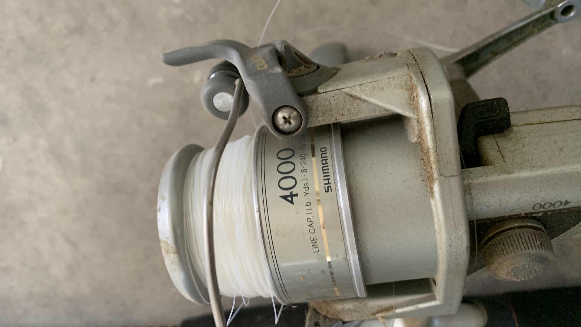 Photo 1 of FOUR FISHING REELS